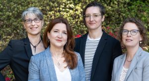 Group photo of Drs. Laila Ferreira, Rebecca Carruthers Den Hoed, and Katja Thieme, with Jennifer Walsh Marr.