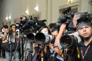 journalists at a conference